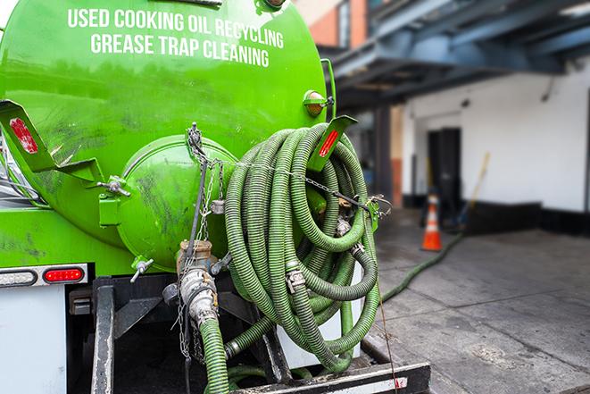 commercial kitchen grease trap being pumped out in Foothill Ranch